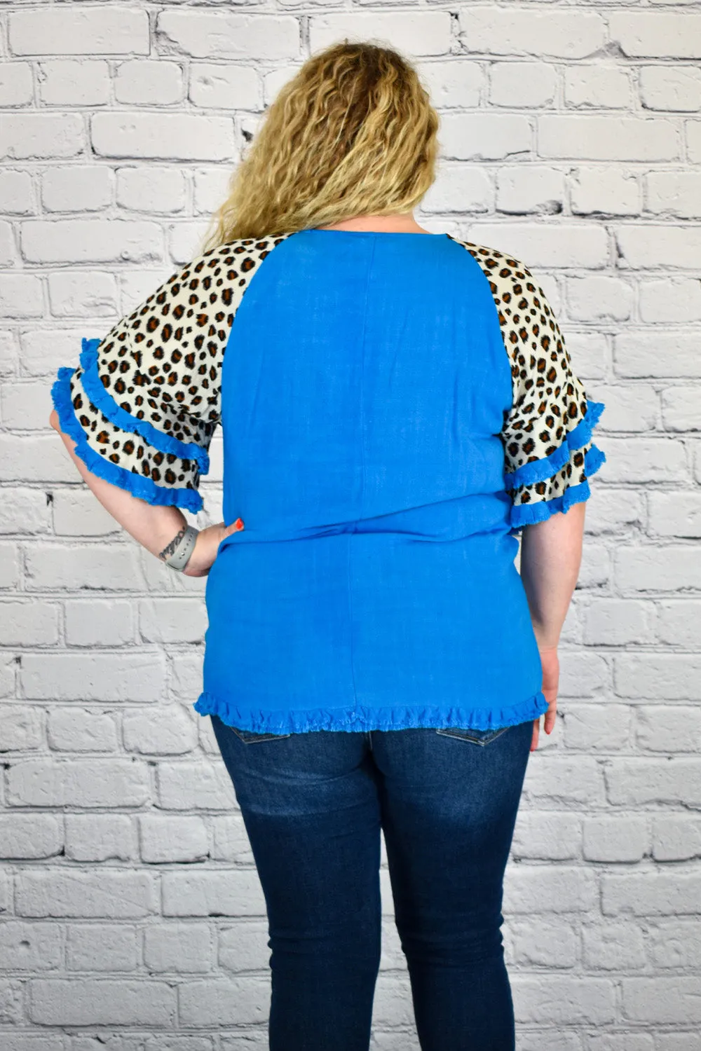 Linen Tunic Top with Animal Print Layered Bell Sleeves in Plus Size by Umgee Clothing