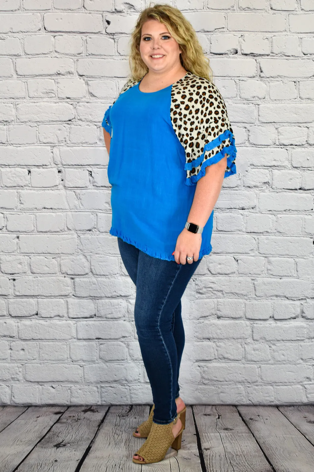 Linen Tunic Top with Animal Print Layered Bell Sleeves in Plus Size by Umgee Clothing